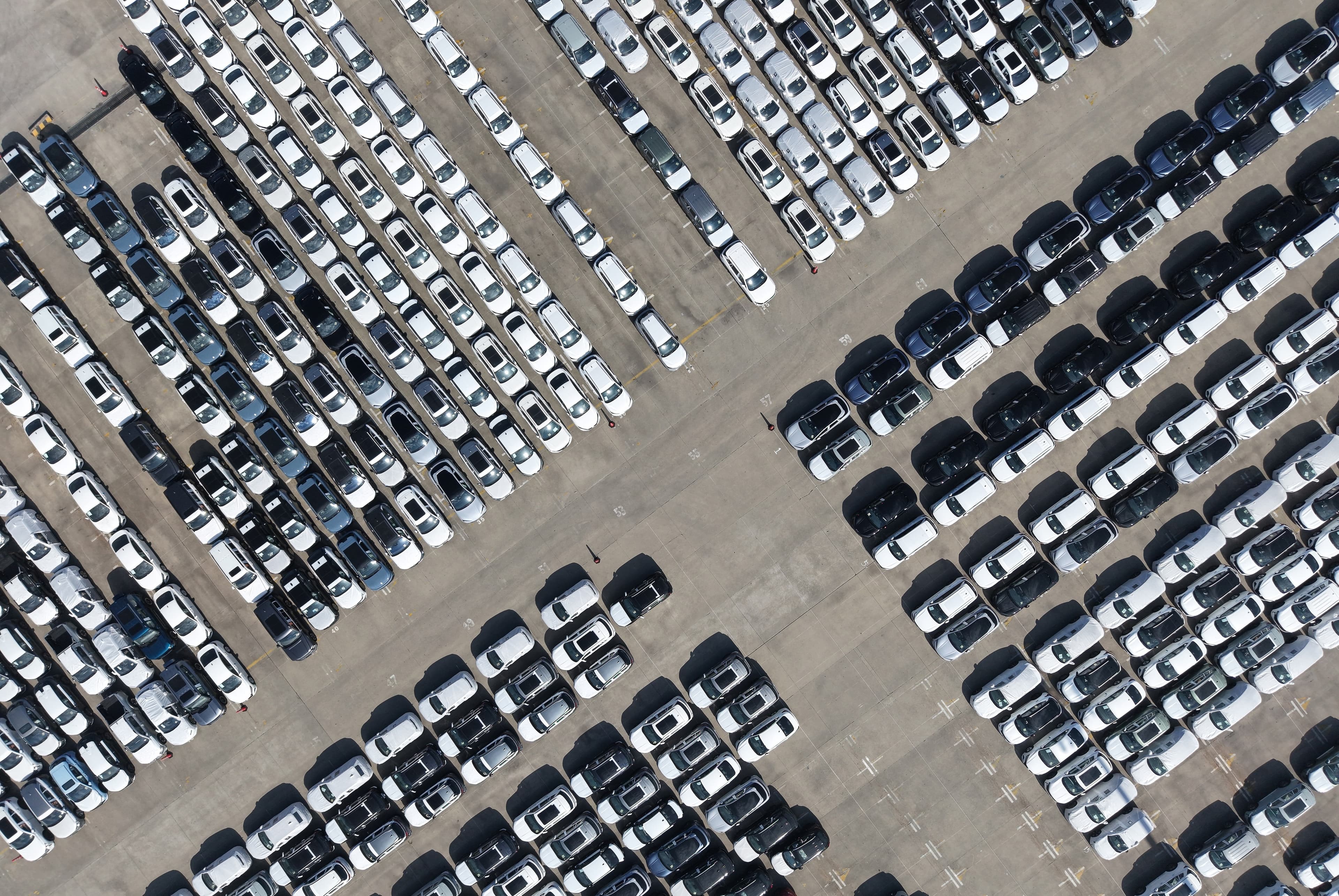 New cars awaiting export at a port in Shanghai